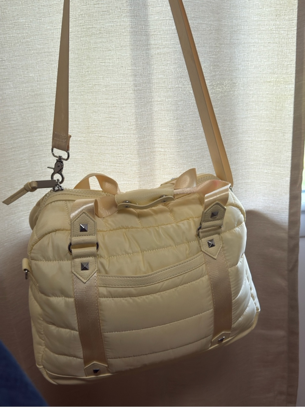 Yellow quilted handbag